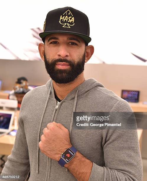 Toronto Blue Jay player Jose Bautista Tries On Apple Watch At The Apple Store in the Eaton Centre Shopping Centre on April 14, 2015 in Toronto,...