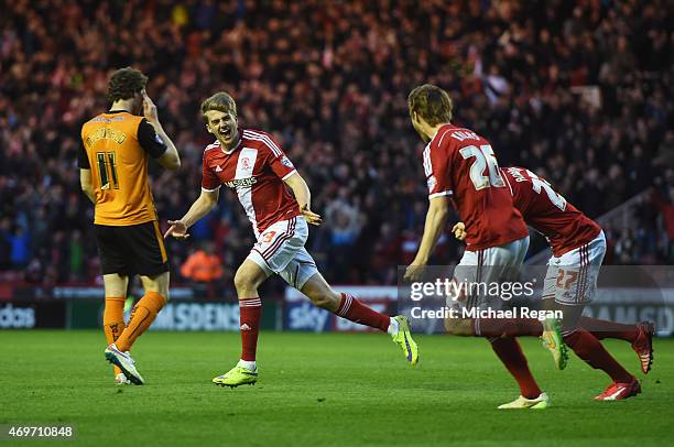 Patrick Bamford of Middlesbrough celebrates with team mates as he scores their second goal during the Sky Bet Championship match between...