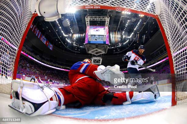 Tomas Tatar of Slovakia misses a shot against Semyon Varlamov of Russia in a shoot out during the Men's Ice Hockey Preliminary Round Group A game on...
