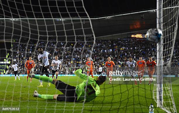 Darren Bent of Derby County scores their fourth goal from a penalty past goalkeeper Elliott Parish of Blackpool during the Sky Bet Championship match...