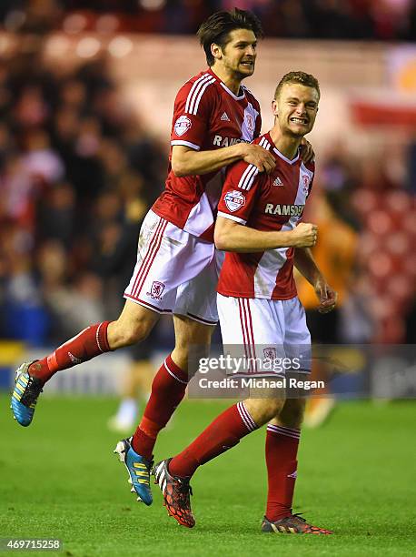 George Friend and Ben Gibson of Middlesbrough celebrate victory after the Sky Bet Championship match between Middlesbrough and Wolverhampton...