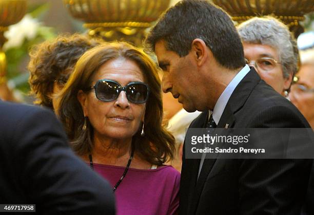 Helena Villagra widow of Eduardo Galeano talks with Raúl Sendic Uruguayan vice president during a funeral ceremony to honor Uruguayan writer and...