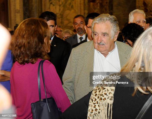 Former uruguayan president Jose Mujica and Helena Villagra widow of Eduardo Galeano talk during a funeral ceremony to honor Uruguayan writer and...