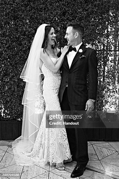 In this handout image provided by David Arquette and Christina McLarty, Christina McLarty and David Arquette were married Sunday, April 12, 2015 in...