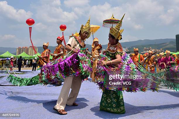 People celebrate Thai lunar new year of 1377 on April 13, 2015 in Xishuangbanna, Yunnan province of China. A celebration was held during 1377 Thai...