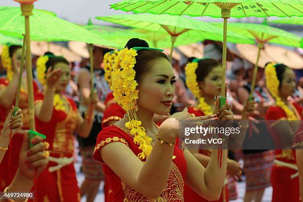 People celebrate Thai lunar new year of 1377 on April 13, 2015 in Xishuangbanna, Yunnan province of China. A celebration was held during 1377 Thai...