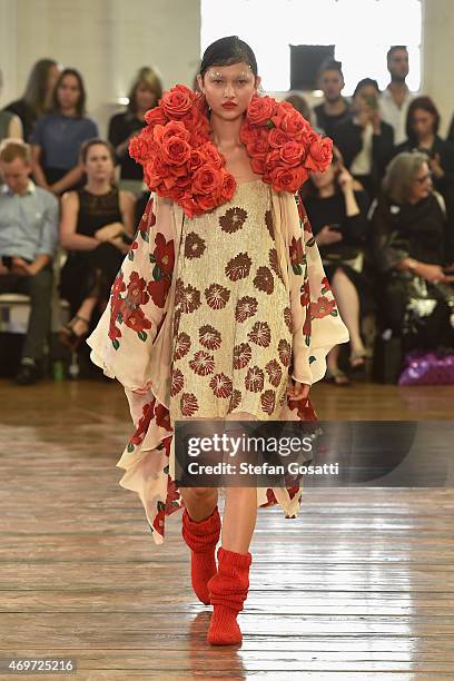 Model walks the runway during the Akira show at Mercedes-Benz Fashion Week Australia 2015 at Carriageworks on April 15, 2015 in Sydney, Australia.