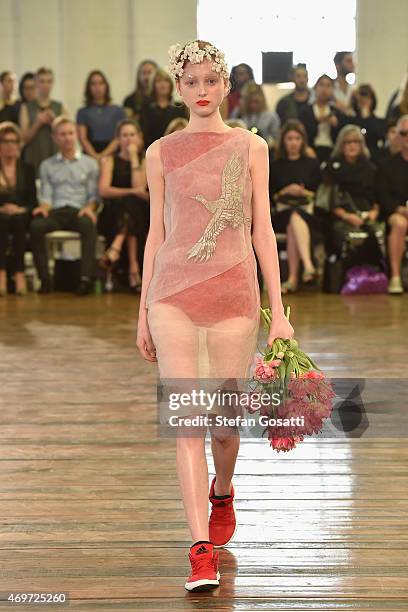 Model walks the runway during the Akira show at Mercedes-Benz Fashion Week Australia 2015 at Carriageworks on April 15, 2015 in Sydney, Australia.