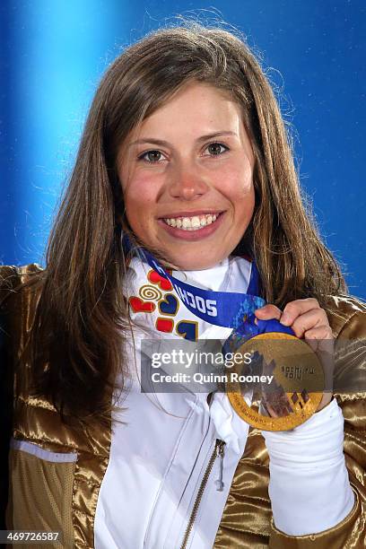 Gold medalist Eva Samkova of the Czech Republic celebrates on the podium during the medal ceremony for the Womens Snowboard Cross on day 9 of the...