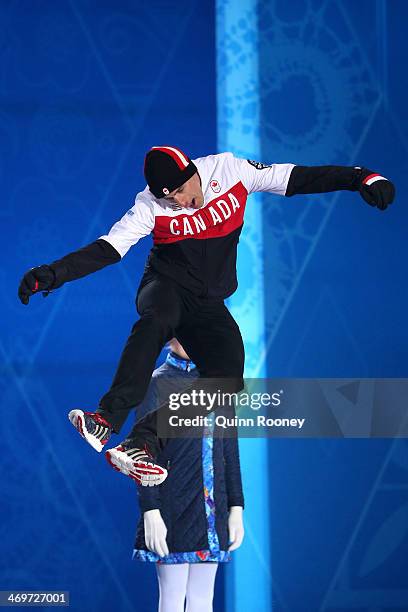 Bronze medalist Denny Morrison of Canada celebrates on the podium during the medal ceremony for the Mens 1500 m Speed Skating on day 9 of the Sochi...