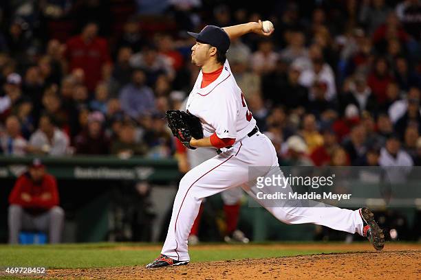 Junichi Tazawa of the Boston Red Sox pitches against the Washington Nationals during the eighth inning at Fenway Park on April 14, 2015 in Boston,...