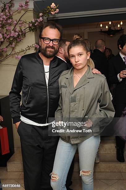 Designer Johan Lindeberg and his daughter Blue Lindeberg attend the A Touch Of Style Book Signing with Carlos Mota at the D&D Building Assouline...