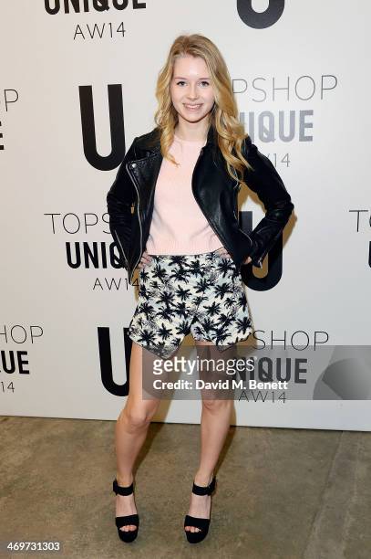 Lottie Moss attends the Topshop Unique show at London Fashion Week AW14 at Tate Modern on February 16, 2014 in London, England.