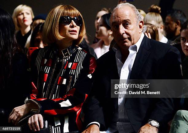 Anna Wintour and Sir Philip Green attend the Topshop Unique show at London Fashion Week AW14 at Tate Modern on February 16, 2014 in London, England.