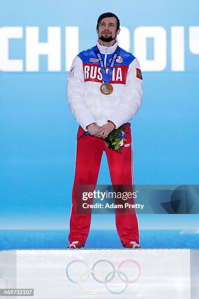 Gold medalist Alexander Tretiakov of Russia celebrates on the podium during the medal ceremony for the Mens Skeleton on day 9 of the Sochi 2014...