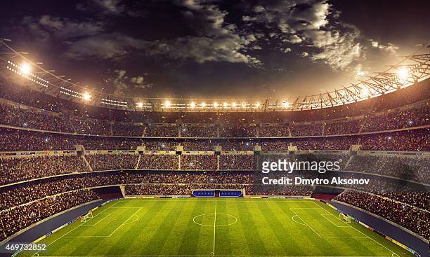 dramatic soccer stadium - football stock pictures, royalty-free photos & images