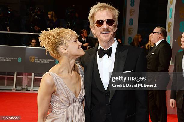 Caridad Rivera and Matthew Modine attend the EE British Academy Film Awards 2014 at The Royal Opera House on February 16, 2014 in London, England.
