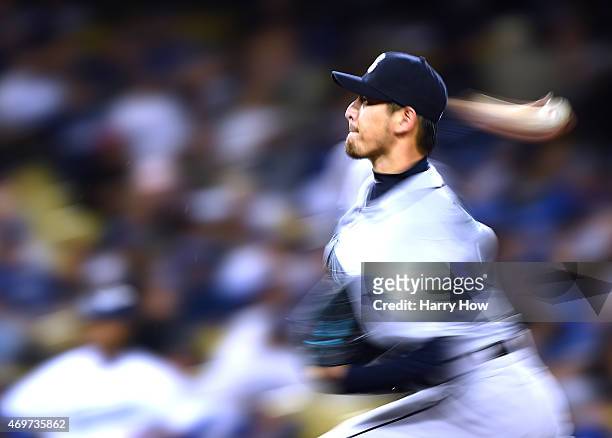 Hisashi Iwakuma of the Seattle Mariners pitches to the Los Angeles Dodgers during the second inning at Dodger Stadium on April 14, 2015 in Los...