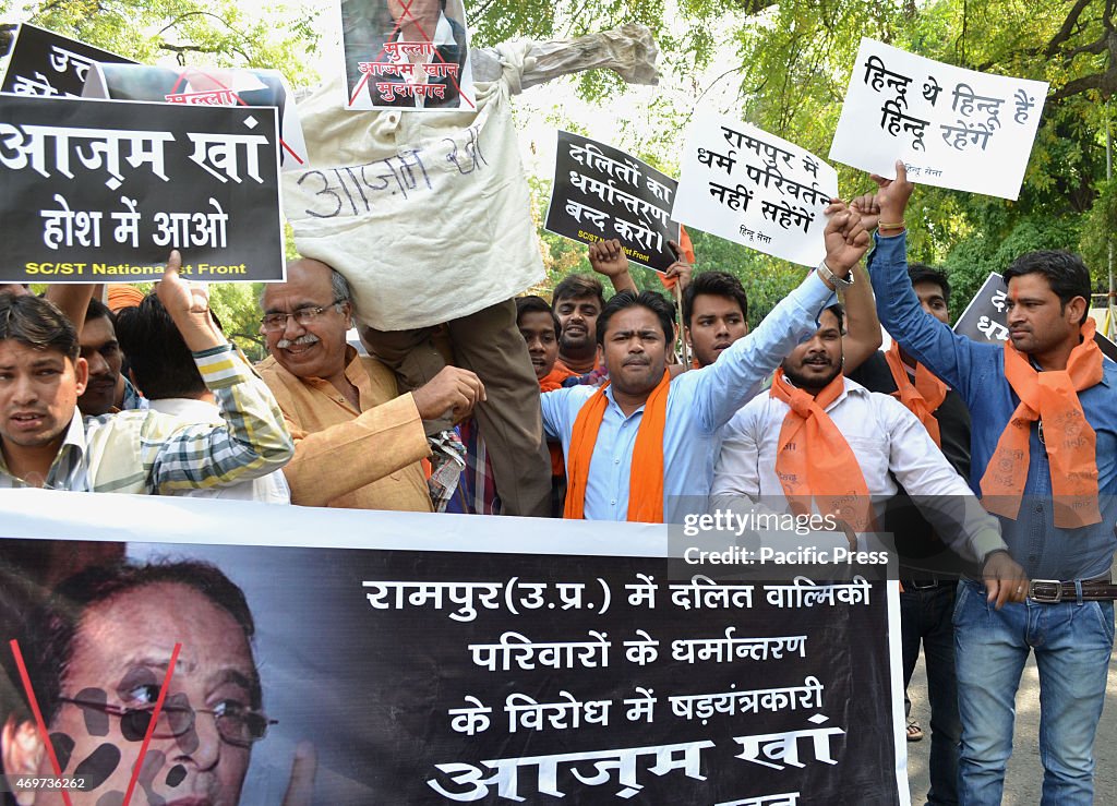 Hindu Sena activist protest and burn effigy of Azam Khan...