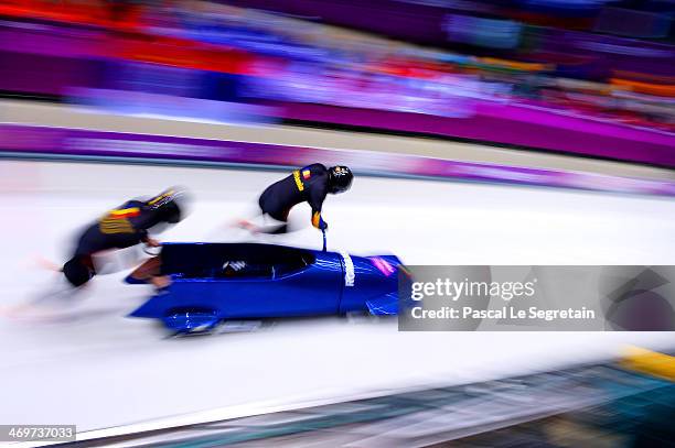 Pilot Nicolae Istrate and Florin Craciun of Romania team 1 make a run during the Men's Two-Man Bobsleigh heats on Day 9 of the Sochi 2014 Winter...