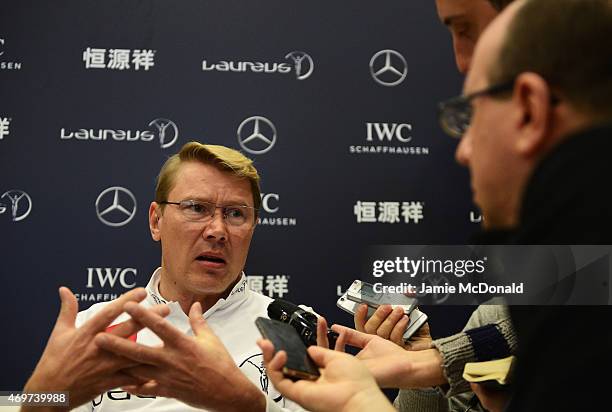 Laureus World Sports Academy member Mika Hakkinen talks during a media interview at the Shanghai Grand Theatre prior to the 2015 Laureus World Sports...