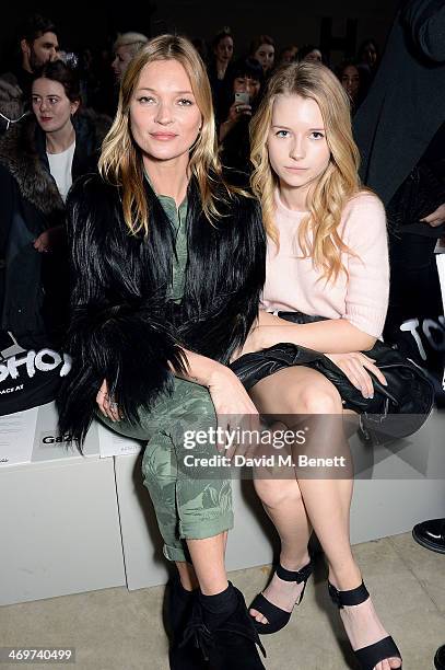 Kate Moss and Lottie Moss attend the Topshop Unique show at London Fashion Week AW14 at Tate Modern on February 16, 2014 in London, England.