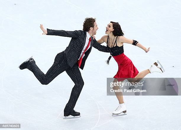 Nathalie Pechalat and Fabian Bourzat of France compete during the Figure Skating Ice Dance Short Dance on day 9 of the Sochi 2014 Winter Olympics at...