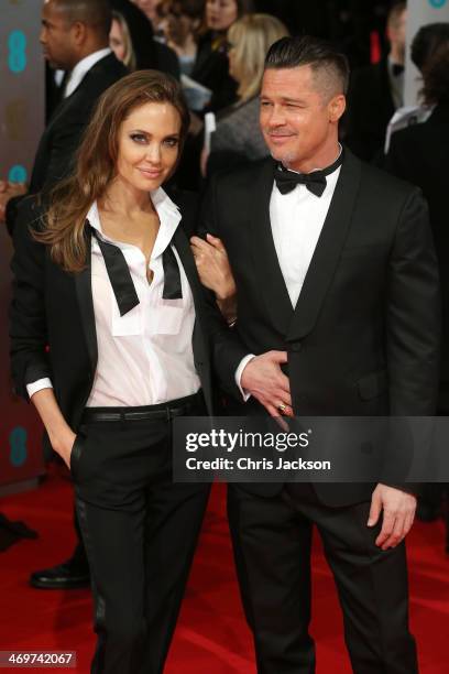 Actors Angelina Jolie and Brad Pitt attend the EE British Academy Film Awards 2014 at The Royal Opera House on February 16, 2014 in London, England.