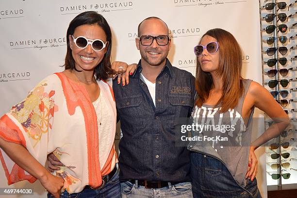 Presenter Laurence Roustandjee, eyeglasses designer Damien Fourgeaud and TV presenter Karine Arsene attend the 'Damien Fourgeaud': Eyeglasses Launch...