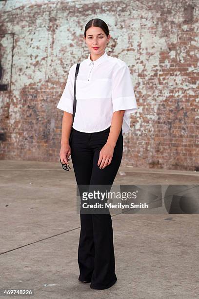 Fashion Blogger Sara Donaldson wears Frame jeans, Josh Goot top, Saint Laurent bag and Toni Bianco shoes at Mercedes-Benz Fashion Week Australia 2015...
