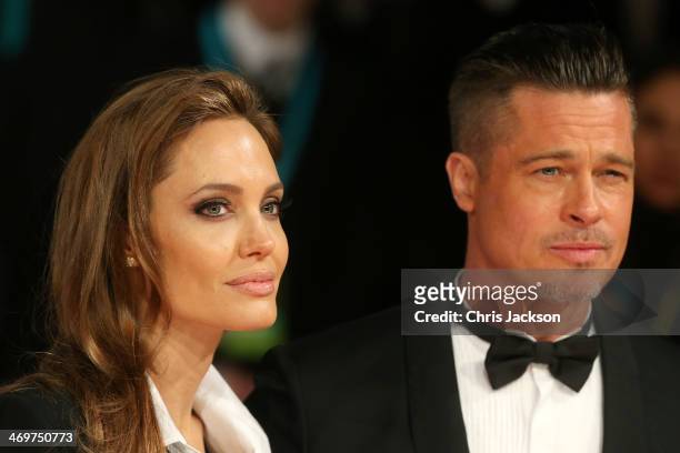 Actors Angelina Jolie and Brad Pitt attend the EE British Academy Film Awards 2014 at The Royal Opera House on February 16, 2014 in London, England.