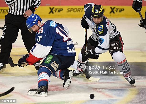 Andrew Joudrey of Mannheim in action against Jared Ross of Ingolstadt during the DEL Play-offs Final Game 3 between Adler Mannheim and ERC Ingolstadt...