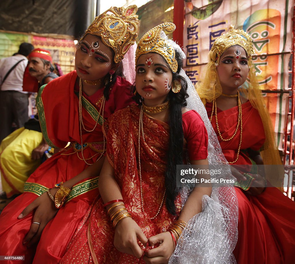 Indian girls dress as Radha at the traditional Gajan...