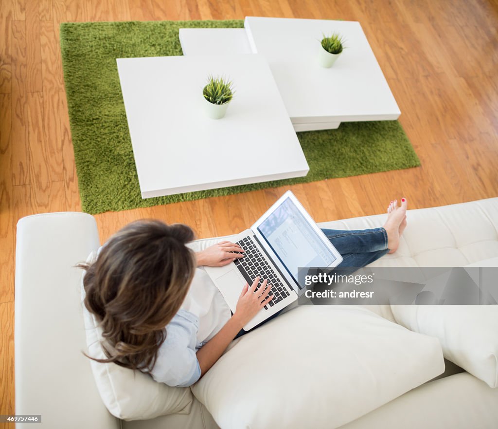 Woman Using The Computer At Home High-Res Stock Photo - Getty Images