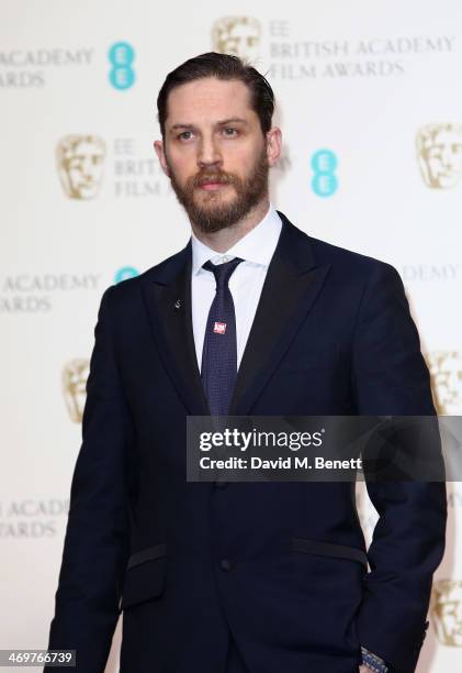 Actor Tom Hardy poses in the winners room at the EE British Academy Film Awards 2014 at The Royal Opera House on February 16, 2014 in London, England.