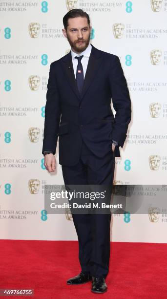 Actor Tom Hardy poses in the winners room at the EE British Academy Film Awards 2014 at The Royal Opera House on February 16, 2014 in London, England.