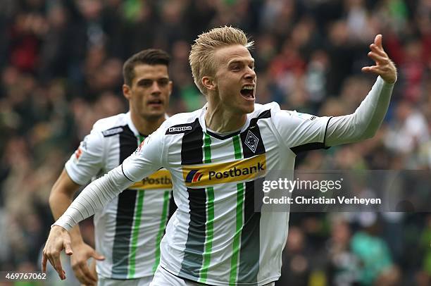 Oscar Wendt of Borussia Moenchengladbach celebrate after their first goal during the Bundesliga match between Borussia Moenchengladbach and Borussia...