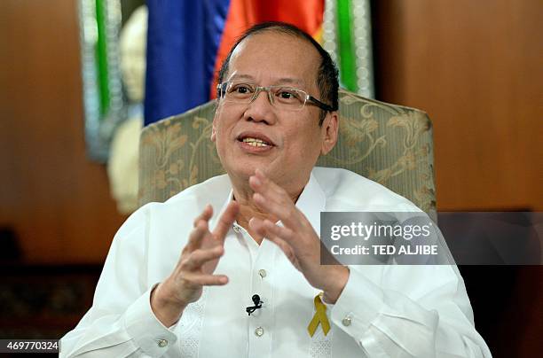 This photo taken on April 14, 2015 during an interview with AFP shows Philippine President Benigno Aquino speaking at the Malacanang Palace in...