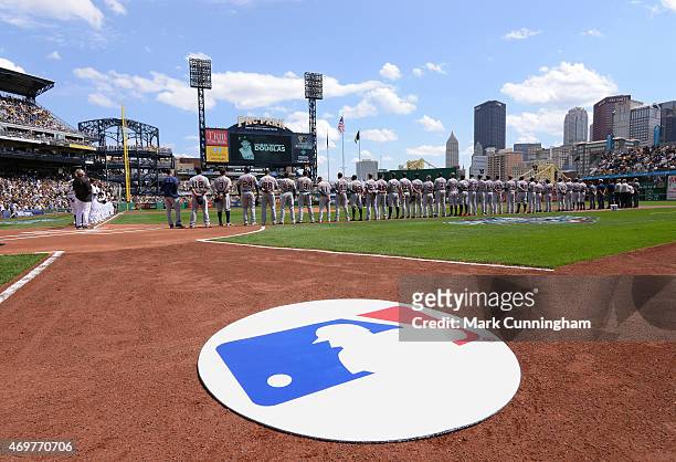 Detailed view of an MLB logo on the field as teams line up for pre-game ceremonies prior to the Opening Day game between the Detroit Tigers and the...