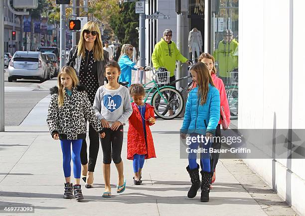 Heidi Klum is seen with her daughters Lou Samuel and Leni Samuel on February 16, 2014 in Los Angeles, California.