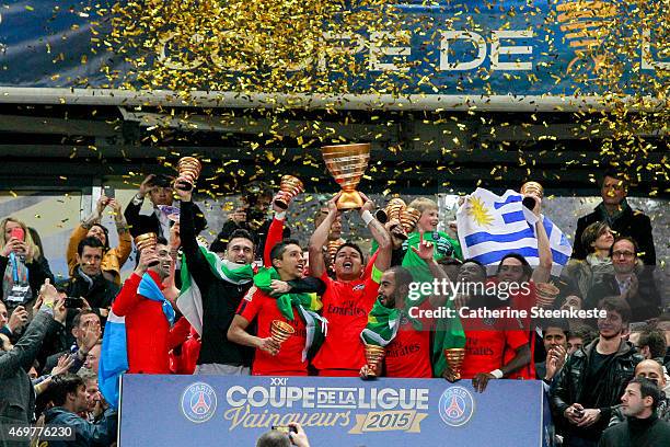 Thiago Silva, captain of Paris Saint-Germain FC lifts up the Coupe de la Ligue Trophy with Javier Pastore, Salvatore Sirigu, Marquinhos, Lucas, Serge...