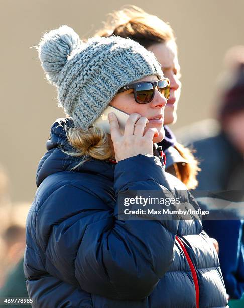 Zara Phillips watches the racing as she attends the Barbury Castle Point-to-Point race meeting at Barbury Racecourse on February 16, 2014 in...