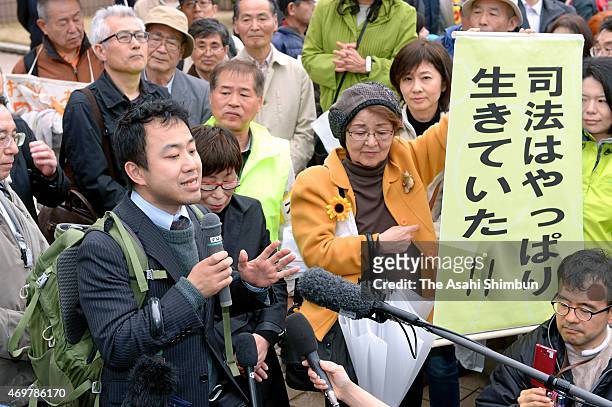 Kazuhiro Kasahara, a lawyer representing plaintiffs, speaks after the Fukui District Court's ruling against the restarts of two reactors at the...
