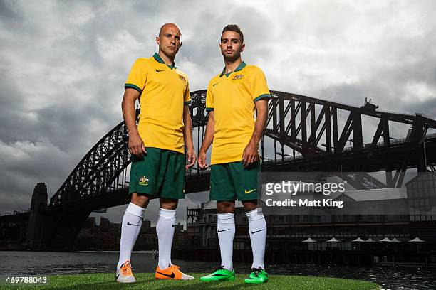 Mark Bresciano and Michael Zullo pose during the Australian Socceroos 2014 FIFA World Cup kit launch on February 17, 2014 in Sydney, Australia.