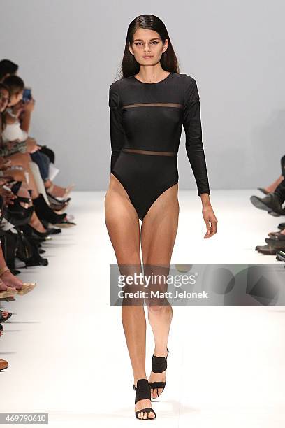 Model walks the runway in a design by Jewels + Grace at the Swim Designer Showcase show at Mercedes-Benz Fashion Week Australia 2015 at Carriageworks...