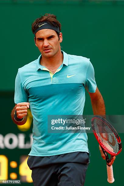 Roger Federer of Switzerland celebrates a point against Jeremy Chardy of France during day four of the Monte Carlo Rolex Masters tennis at the...