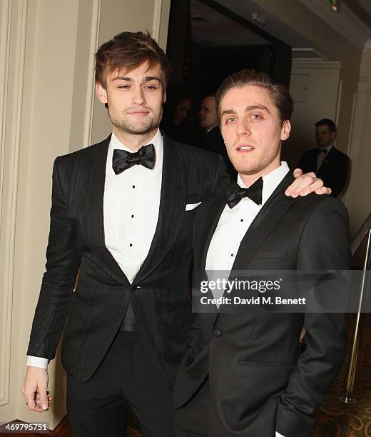 Douglas Booth and guest attend the official dinner party after the EE British Academy Film Awards at The Grosvenor House Hotel on February 16, 2014...