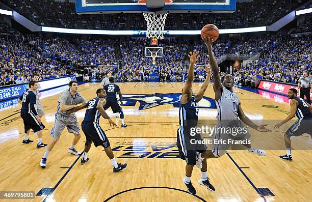 Austin Chatman of the Creighton Bluejays drives to the basket past Tony Chennault of the Villanova Wildcats during their game at CenturyLink Center...