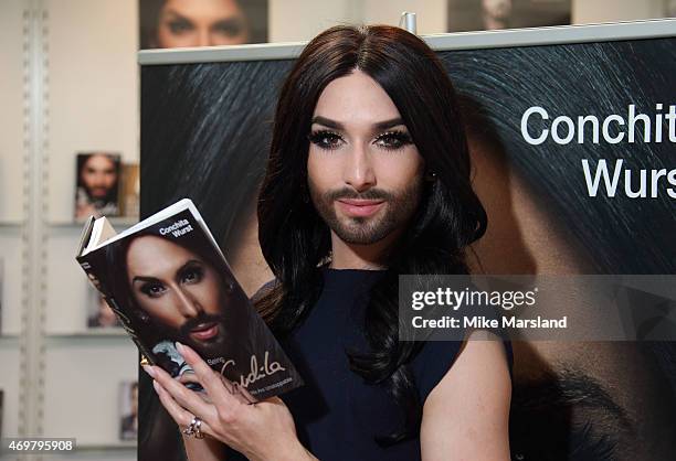 Conchita Wurst attends a photocall during the London Book Fair where she is signing copies of her autobiography 'Being Conchita' at Olympia...