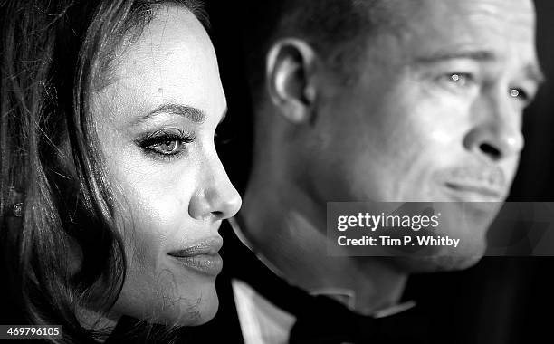 Angelina Jolie and Brad Pitt attend the EE British Academy Film Awards 2014 at The Royal Opera House on February 16, 2014 in London, England.